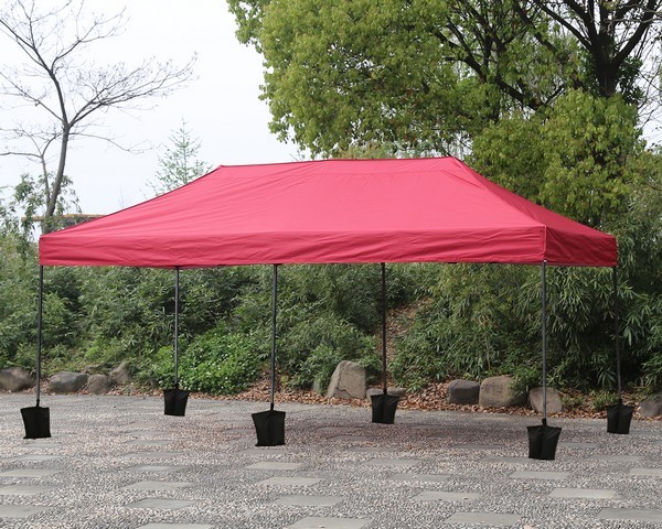 Gazebo pieghevole 6x3 rosso in acciaio 40 mm montato all'aperto
